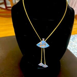 Asian inspired gold and painted necklace.